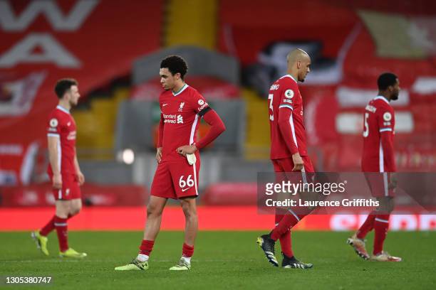 Trent Alexander-Arnold of Liverpool and Fabinho of Liverpool look dejected following their team's defeat in the Premier League match between...