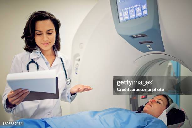 doctor is working with ct scan in a hospital - mri abdomen stock pictures, royalty-free photos & images