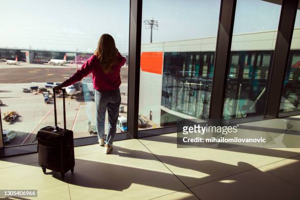 thinking about her next flight - west asia stock pictures, royalty-free photos & images