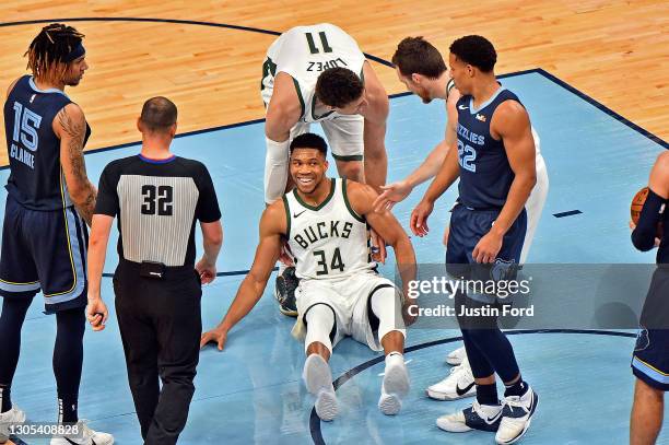 Giannis Antetokounmpo of the Milwaukee Bucks reacts after the play during the first half against the Memphis Grizzlies at FedExForum on March 04,...