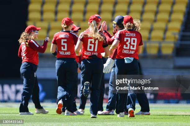 England celebrate dismissing Hayley Jensen of the White Ferns during games two of the International T20 series between the New Zealand White Ferns...