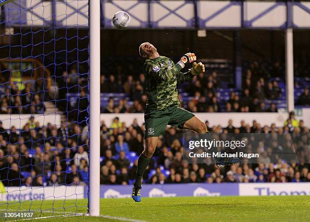 Jan Mucha of Everton watches the lob of Salomon Kalou of Chelsea head for the back of the net for the opening goal during the Carling Cup Fourth...