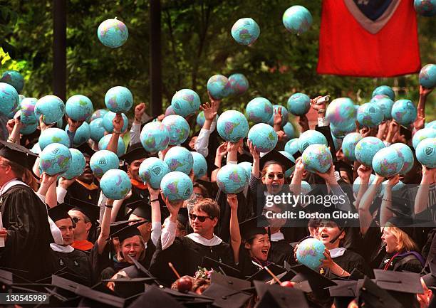 Graduates from the John F. Kennedy School of Government at Harvard University celebrate during commencement exercises in Cambridge.