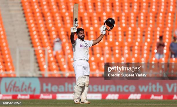 Rishabh Pant of India celebrates reaching his century during Day Two of the 4th Test Match between India and England at the Narendra Modi Stadium on...