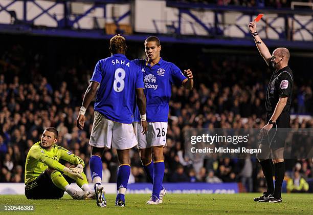 Referee Lee Mason sends off Ross Turnbull of Chelsea following his foul on Louis Saha of Everton during the Carling Cup Fourth Round match between...