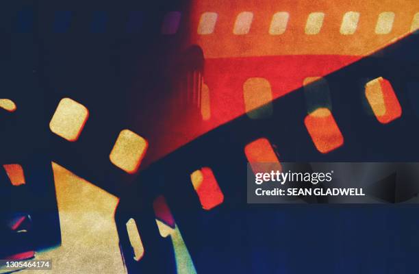 background filmstrip - vintage movie poster stock pictures, royalty-free photos & images