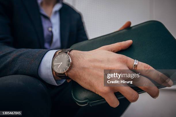 fashionable gentleman with man purse - jewelry stock pictures, royalty-free photos & images