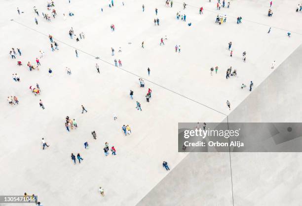 aerial view of crowd on the edge of a cliff - crowd of people above stock pictures, royalty-free photos & images