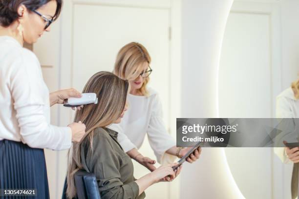 287 Hair Salon Tablet Photos and Premium High Res Pictures - Getty Images