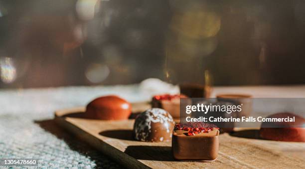 close-up of luxurious chocolates - box of chocolates stock pictures, royalty-free photos & images