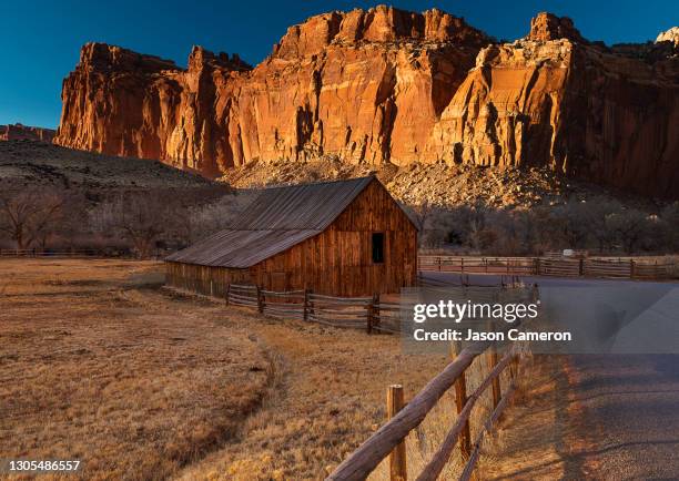 castle and barn - capitol reef national park fotografías e imágenes de stock