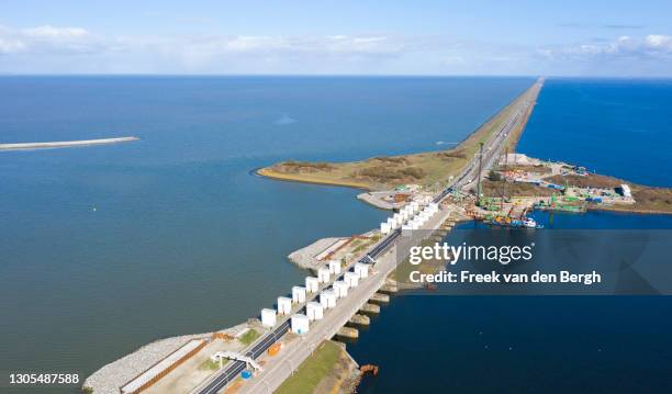 The Stevinsluizen, one of three locks that control the water level of the IJsselmeer, on March 5, 2021 in Den Oever, Netherlands. With a population...