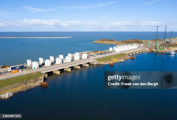 The Stevinsluizen, one of three locks that control the water level of the IJsselmeer, on March 5, 2021 in Den Oever, Netherlands. With a population...