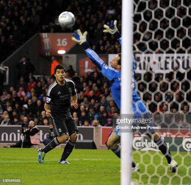 Luis Suarez of Liverpool scores the second during the Carling Cup Fouth Round match between Stoke City and Liverpool at Britannia Stadium on October...