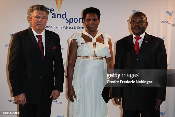 Joel Bouzou, H.E Mister Pierre Nkurunziza and his wife attend the Peace & Sport 5th International Forum on October 26, 2011 in Monaco, Monaco.