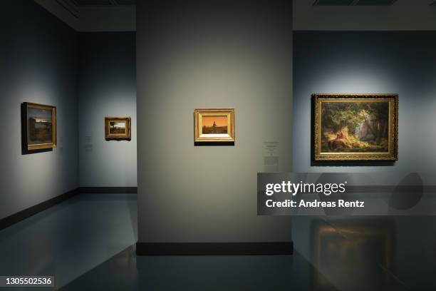 The painting "Woman before the rising or setting Sun" by Caspar David Friedrich and other paintings are on display at the exhibition "Caspar David...