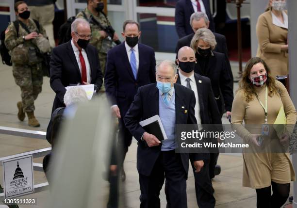 Senators, including Sen. Chuck Grassley , arrive for a vote at the U.S. Capitol March 05, 2021 in Washington, DC. The Senate continues to debate the...