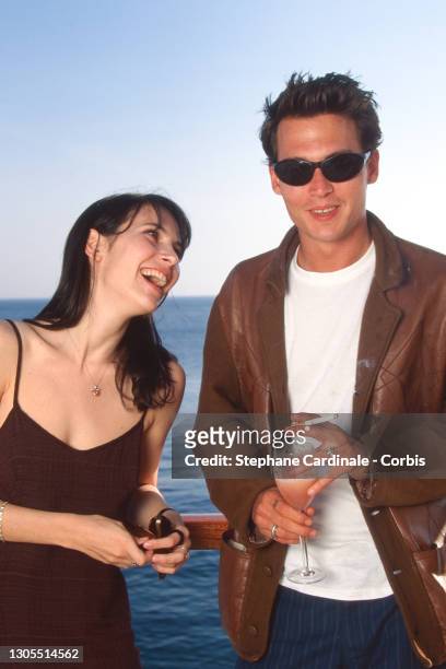 Geraldine Pailhas and Johnny Depp pose for « Don Juan DeMarco » movie during the 48th Annual Cannes Film Festival on May 24, 1995 in Cannes, France.