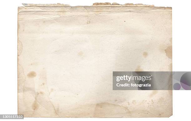 blank piece of a torn old paper - ouderwets stockfoto's en -beelden