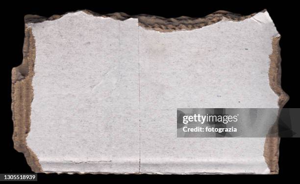 piece of torn cardboard - black craft paper stock pictures, royalty-free photos & images