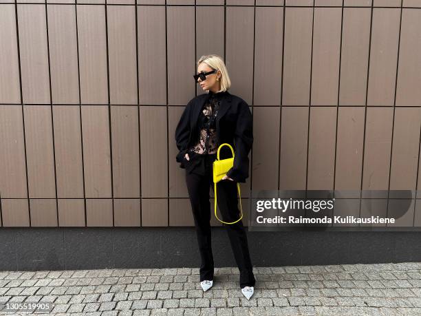 Justyna Czerniak cherishing Paris Fashion Designers for Paris fashion week by wearing Acne Studios black semitransparent shirt, black blazer and...
