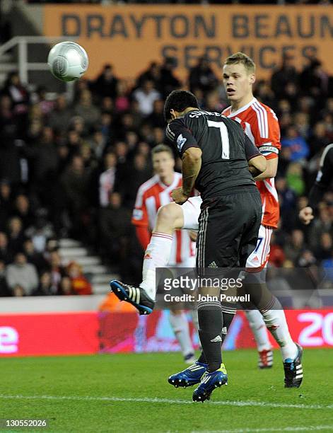 Luis Suarez of Liverpool scores the second during the Carling Cup Fouth Round match between Stoke City and Liverpool at Britannia Stadium on October...
