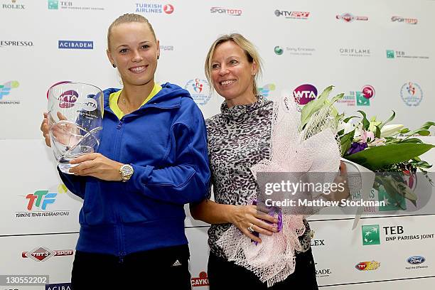 Caroline Wozniacki of Denmark poses with her mother Anna Wozniack after seccuring the year end number WTA ranking during the TEB BNP Paribas WTA...