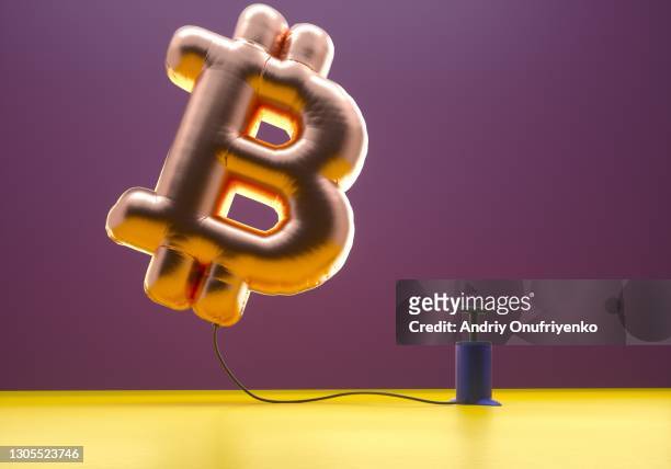 Bitcoin sign balloon inflating