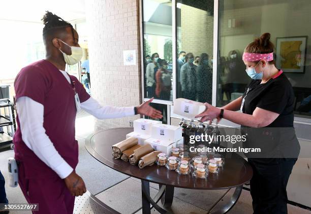 Healthcare Professionals receiving meals during Mountain Dew/Pepsi Stronger Together Meal Giveback Initiative at Northside Medical Center on March...