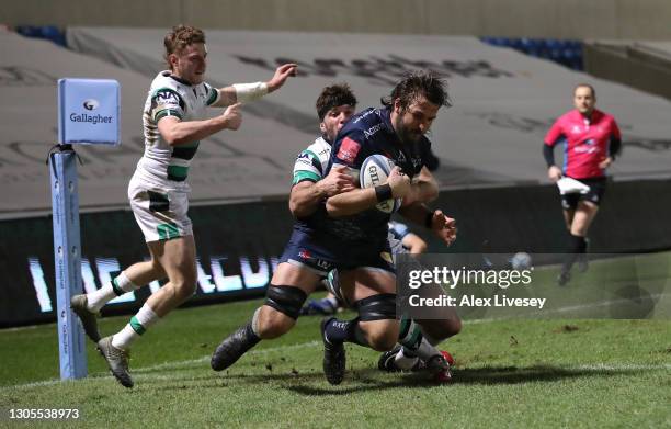 Sale Sharks forward Lood De Jager shrugs off the tackle of Marco Fuser and Tom Penny to cross for the second Sharks try during the Gallagher...