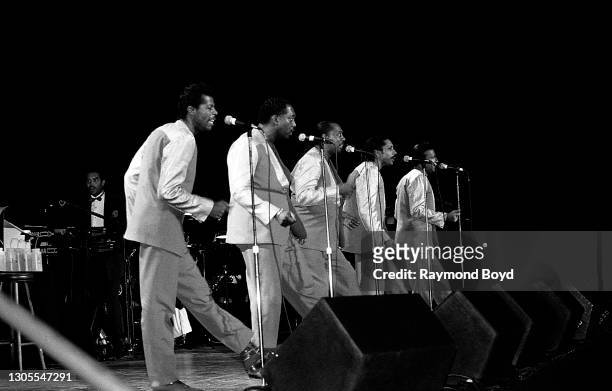 Singers Ali-Ollie Woodson, Otis Williams, Melvin Franklin, Ron Tyson and Richard Street of The Temptations performs at the Regal Theater in Chicago,...