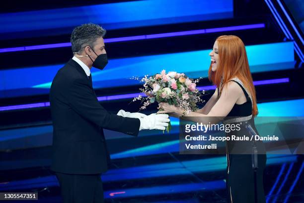 Fiorello and Noemi are seen on stage during the 71th Sanremo Music Festival 2021 at Teatro Ariston on March 05, 2021 in Sanremo, Italy.