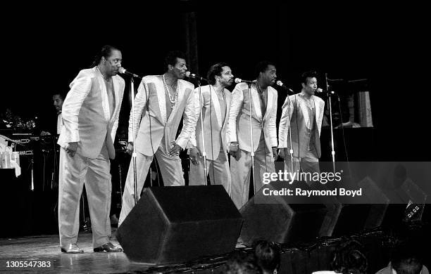 Singers Melvin Franklin, Ali-Ollie Woodson, Ron Tyson, Otis Williams and Richard Street of The Temptations performs at the Regal Theater in Chicago,...