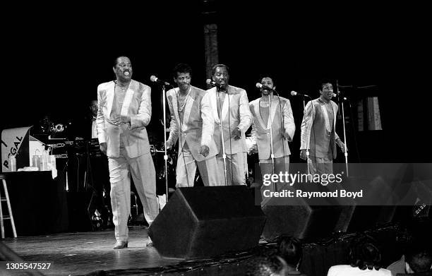 Singers Melvin Franklin, Ali-Ollie Woodson, Otis Williams, Ron Tyson and Richard Street of The Temptations performs at the Regal Theater in Chicago,...