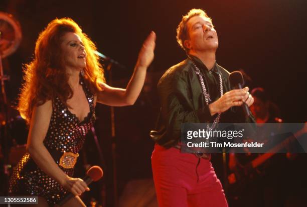 Kate Pierson and Fred Schneider of The B-52's perform at Shoreline Amphitheatre on October 17, 1992 in Mountain View, California.