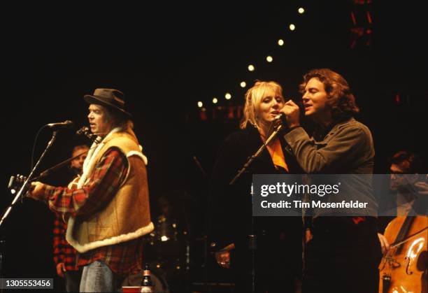 Neil Young, Pegi Young, and Eddie Vedder perform during Neil Young's Annual Bridge School Benefit finale at Shoreline Amphitheatre on October 18,...