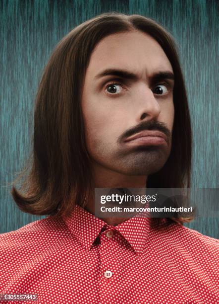 surprised weird man, portrait in studio in retro style - ugly face stock pictures, royalty-free photos & images