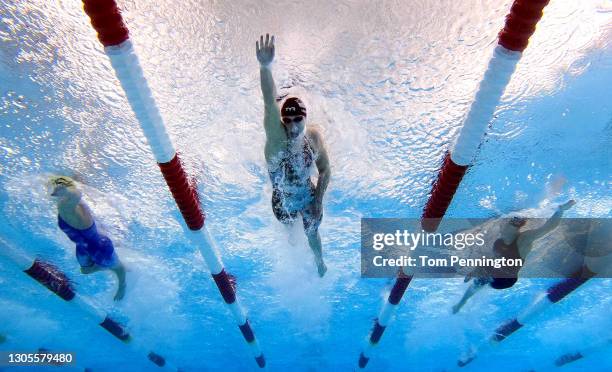 Katie Ledecky, center, leads Kathryn McLaughlin, left, and Madisyn Cox, right, to win the Women's 200 Meter Freestyle Final on Day Three of the TYR...