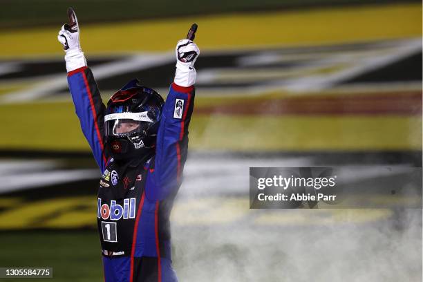 John Hunter Nemechek, driver of the Mobil 1 Toyota, celebrates after winning the NASCAR Camping World Truck Series Bucked Up 200 at The Bullring at...