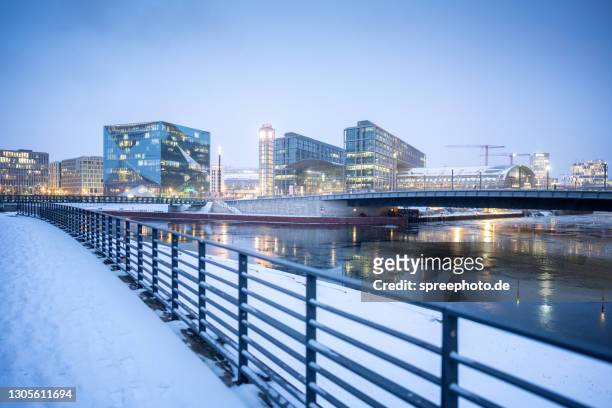berlin, central station and cube at winter - berlin winter stock pictures, royalty-free photos & images