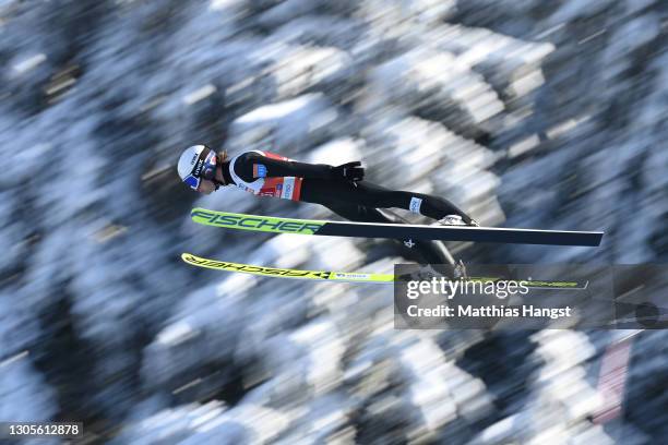Espen Andersen of Norway competes in the ski jumping leg during the Men's Nordic Combined Team HS137/4x7.5 Km at the FIS Nordic World Ski...