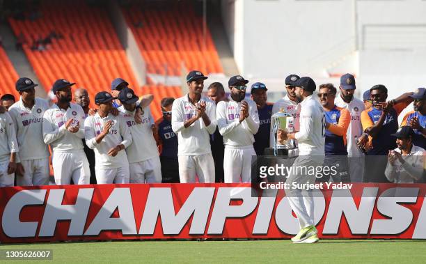 Virat Kohli of India celebrates with teammates after victory on Day Three of the 4th Test Match between India and England at the Narendra Modi...