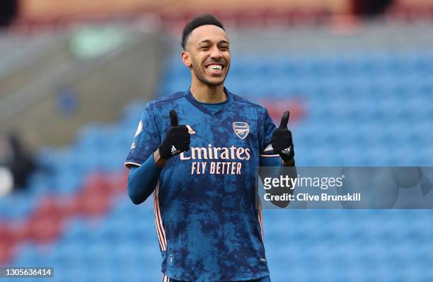 Pierre-Emerick Aubameyang of Arsenal celebrates after scoring his team's first goal during the Premier League match between Burnley and Arsenal at...
