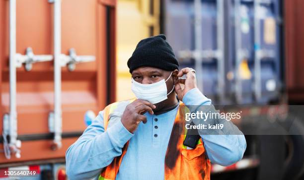 Cargo Container Maskcot Dock Worker Mask Photos and Premium High Res Pictures - Getty Images
