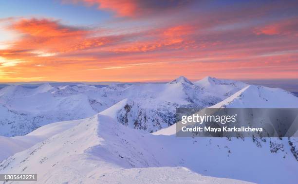 sunset view from snowcone mountain peak with beautif pink sky with clouds - pirin mountains stock pictures, royalty-free photos & images