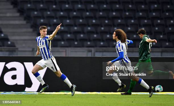 Krzysztof Piatek of Hertha BSC celebrates with teammate Matteo Guendouzi after scoring his team's first goal during the Bundesliga match between...