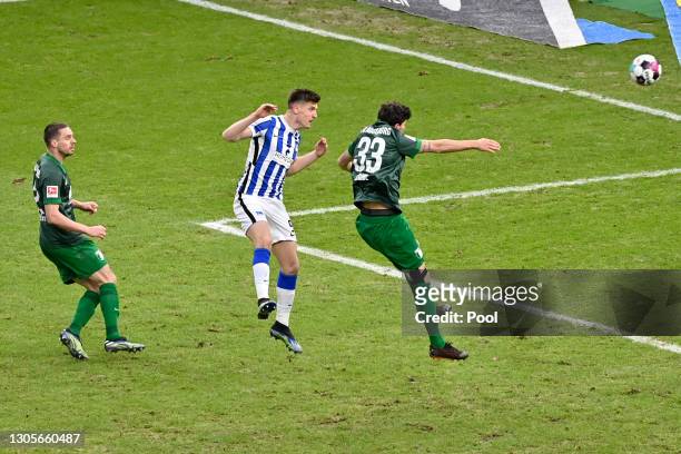 Krzysztof Piatek of Hertha BSC scores his team's first goal during the Bundesliga match between Hertha BSC and FC Augsburg at Olympiastadion on March...