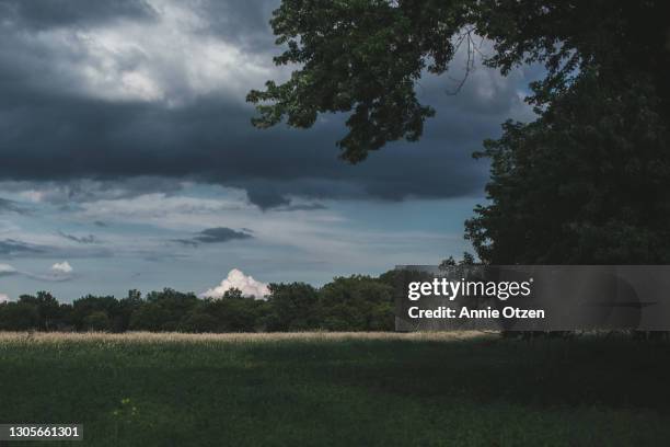distant storm - sioux falls stock pictures, royalty-free photos & images