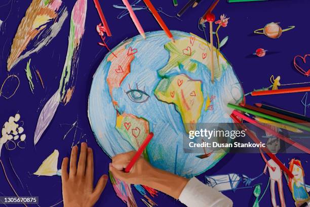 children's hands drawing  the planet earth - child imagination stock illustrations