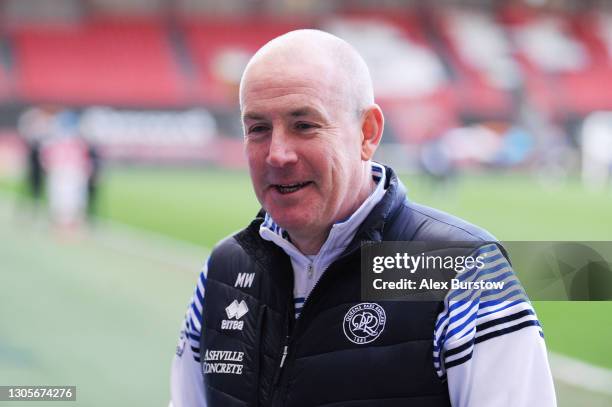 Mark Warburton, Manager of Queens Park Rangers talks to the media pitchside after the Sky Bet Championship match between Bristol City and Queens Park...